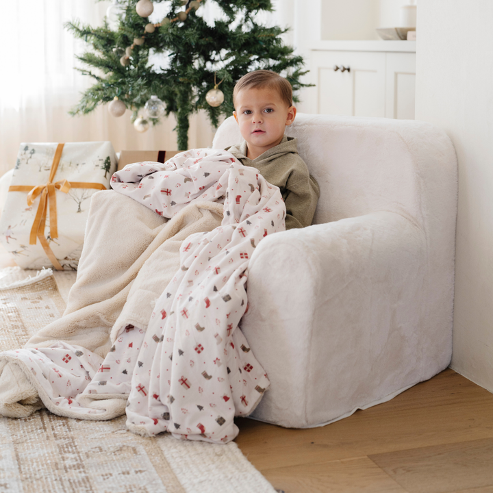 Bring comfort and style to the nursery with the Cream Saranoni Snuggle Up Chair, a cozy kids lounger.