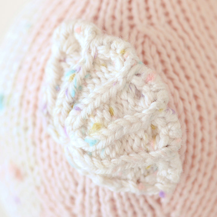 Cuddle + Kind Seahorse in soft pink makes a perfect addition to a nursery of toy animals