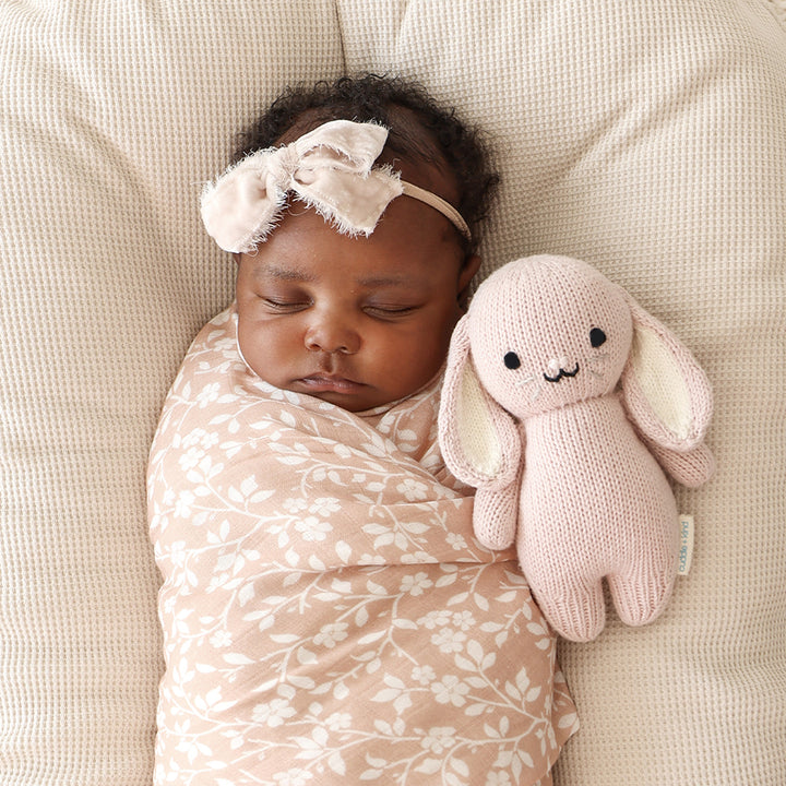 Sweet and soft, the Baby Rose Bunny from Cuddle + Kind is perfect for stuffed animal fans