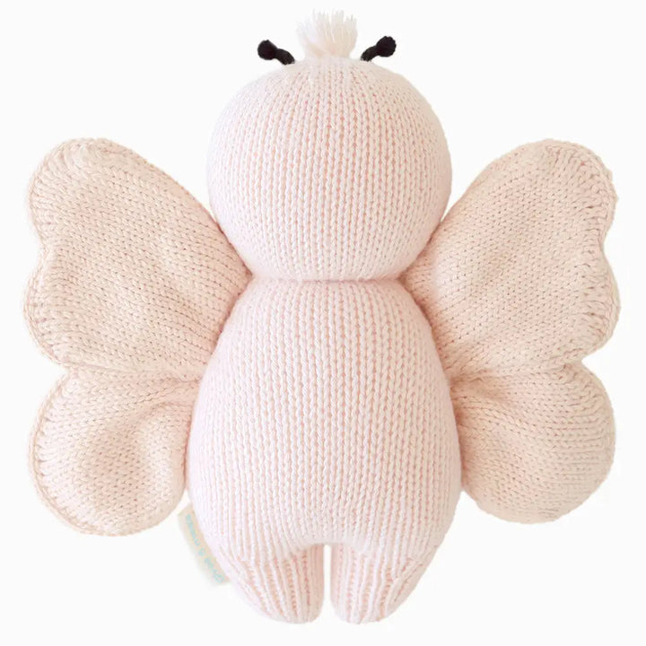 In petal pink, the Baby Butterfly from Cuddle + Kind adds whimsy to any collection of plush toys