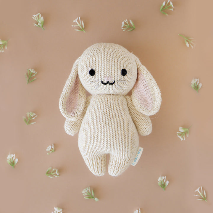 Sweet and huggable, this Oatmeal Bunny by Cuddle + Kind is ideal for toy animals collections