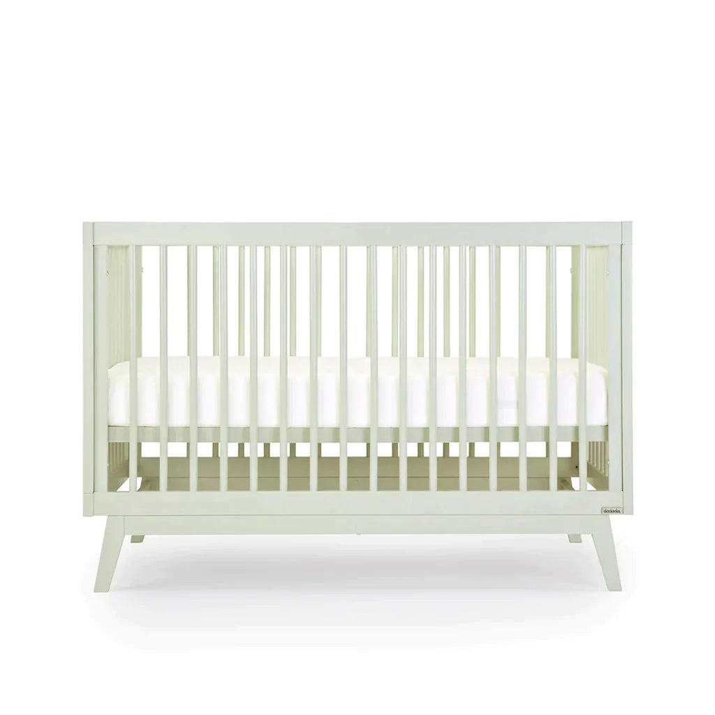 dadada Sage Soho 3-in-1 Convertible Crib to Toddler Bed Furniture. Pastel green in color. Front view, different height.