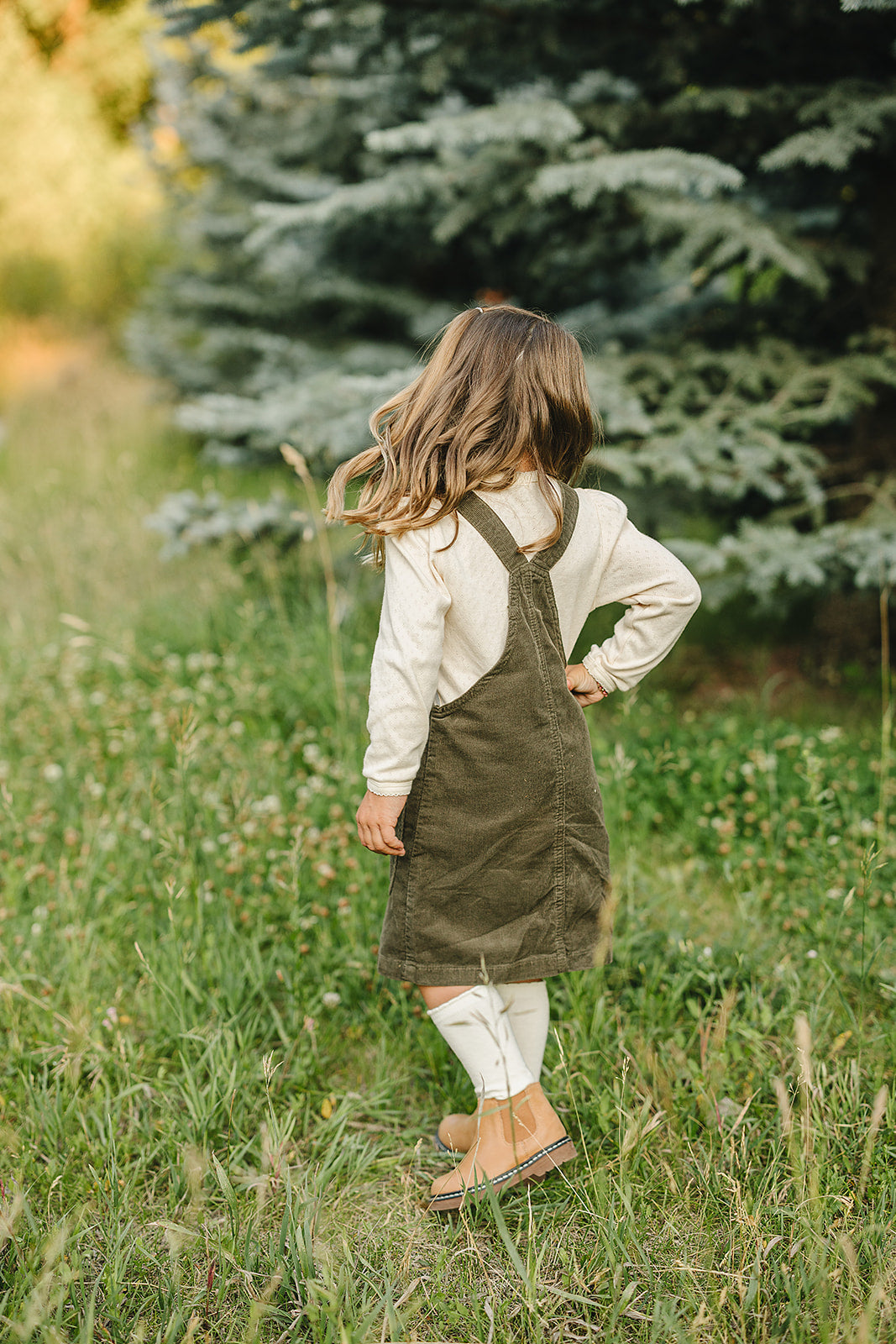 Mebie Baby Green Corduroy Dress shown in rich green tones, a staple choice among best baby clothes