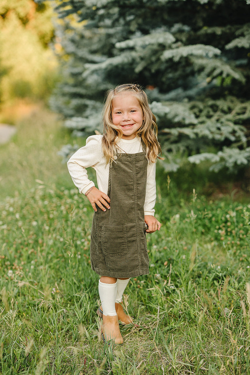 Designed for little moments, the Mebie Baby Green Corduroy Dress fits beautifully into organic baby clothes wardrobes