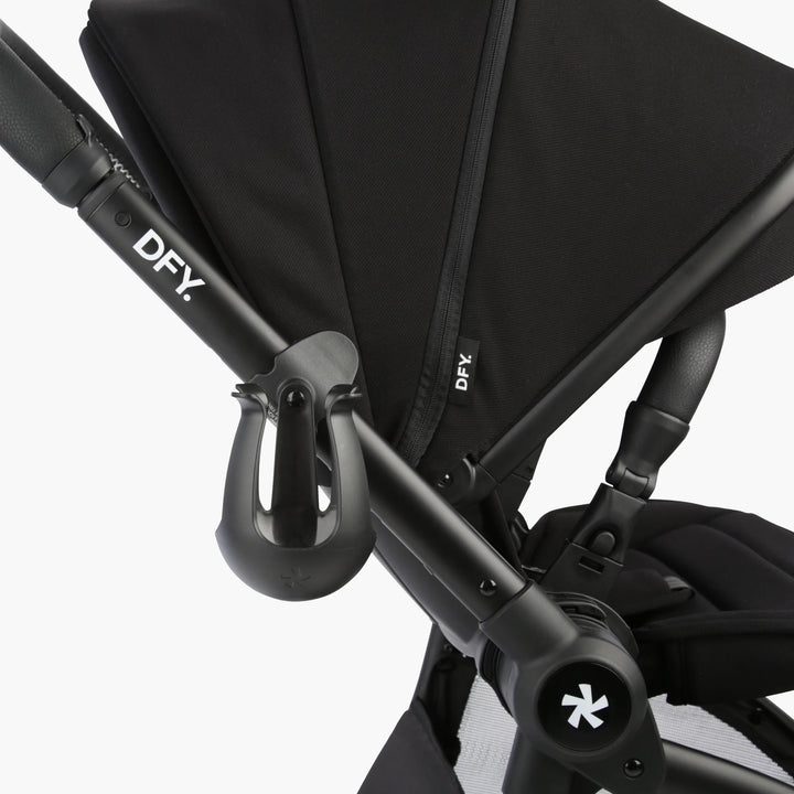 Easily attach the DFY. R1 Cup Holder for on-the-go hydration during toddler stroller walks.