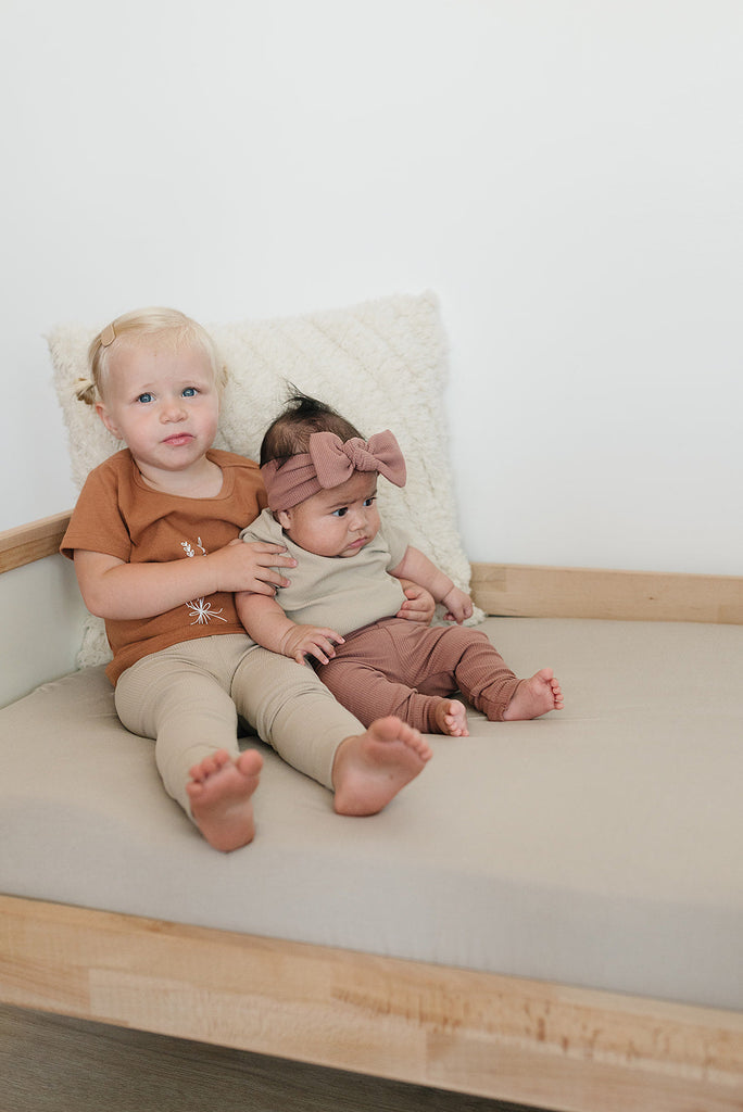 Babies wearing the Mebie Baby organic cotton leggings 