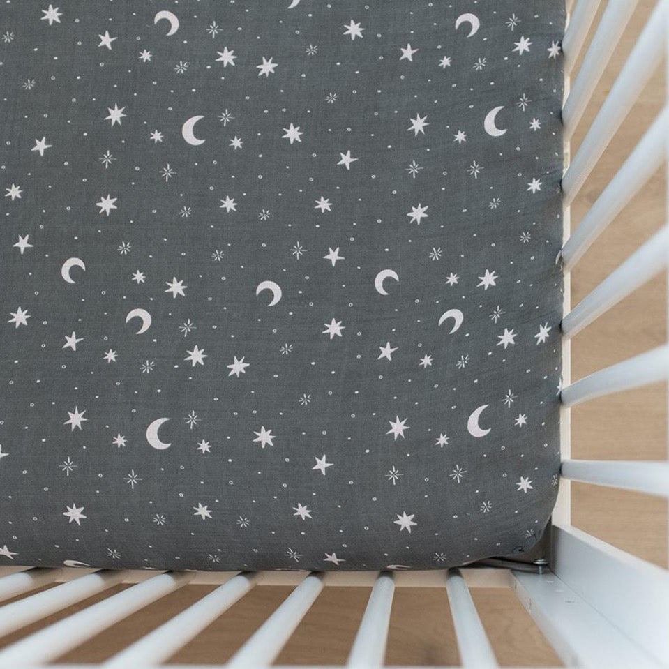 Night Sky Muslin Crib Sheet by Mebie Baby in night sky blue, best crib sheets