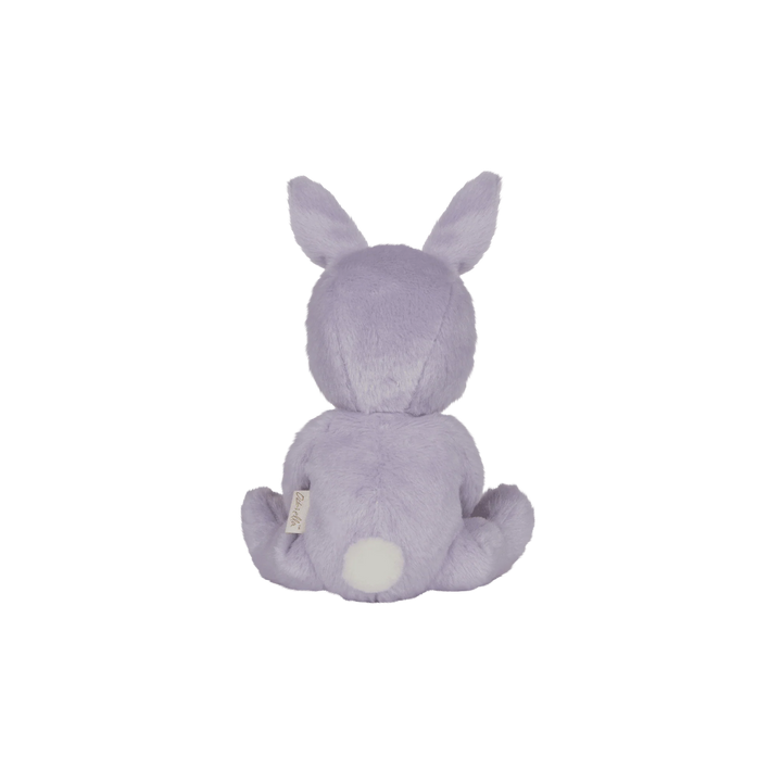 From a side angle, Olli Ella Dinky Dinkums Dolls Ð Babs Bunny Ð Purple reveals its floppy ears and soft texture as a classic stuffed toy.