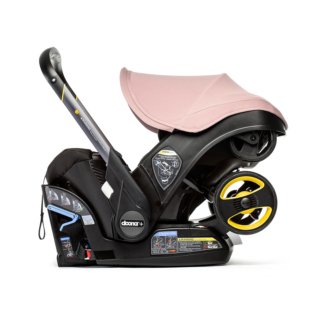 Doona stroller and newborn cat seatin Blush Pink