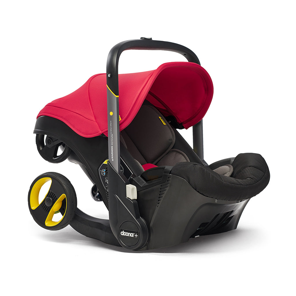 Doona carseat and stroller in flame red