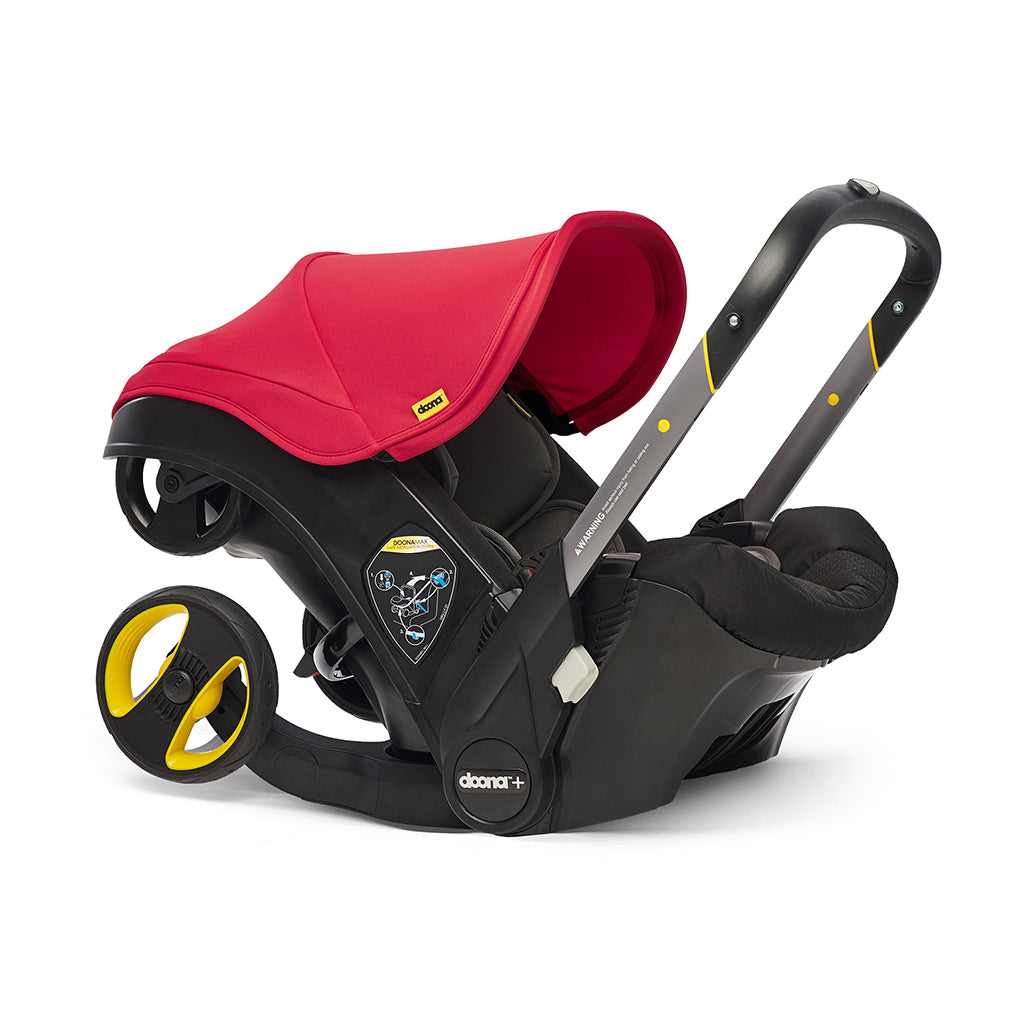  doona baby stroller with car seat in flame red