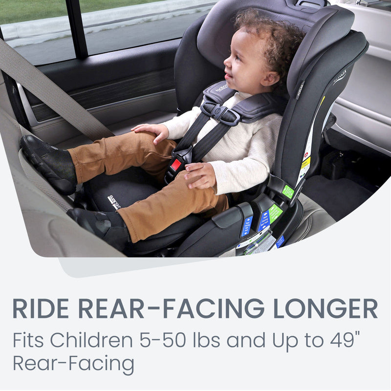 Baby riding rear-facing in Britax Poplar convertible car seat, demonstrating extended rear-facing use up to 50 lbs
