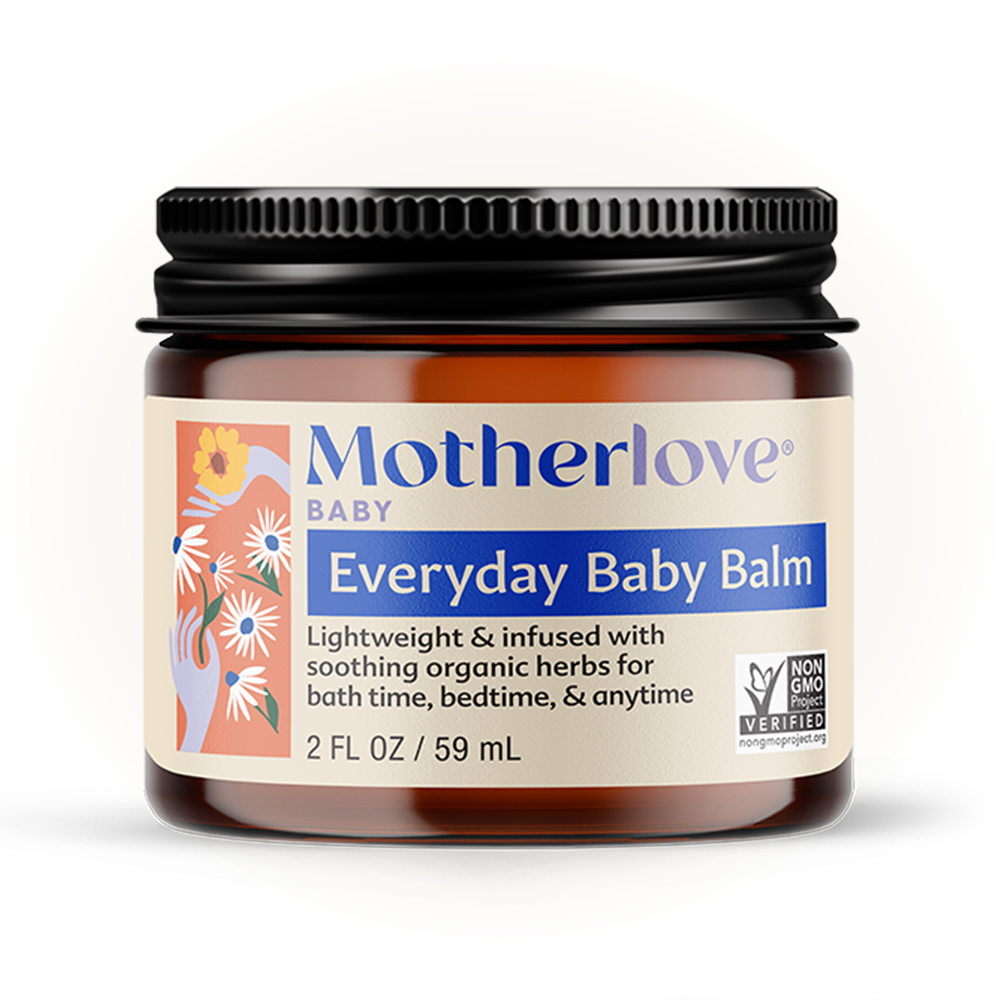 Close-up of Motherlove Everyday Baby Balm jar, crafted from organic ingredients for gentle and nourishing skin balm care.