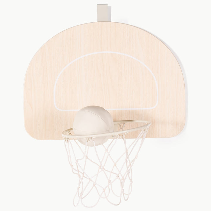Close up of the wooden rim and net on Gathre's basketball hoop for the door