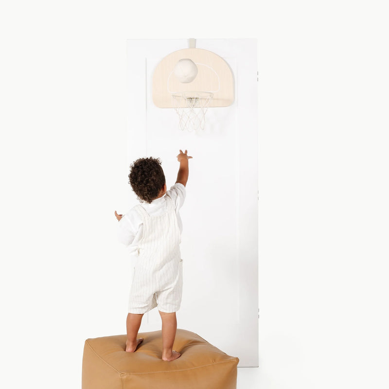 Neutral Gathre Doorway Basketball Hoop framed in wood, combining aesthetics and fun in educational toys.