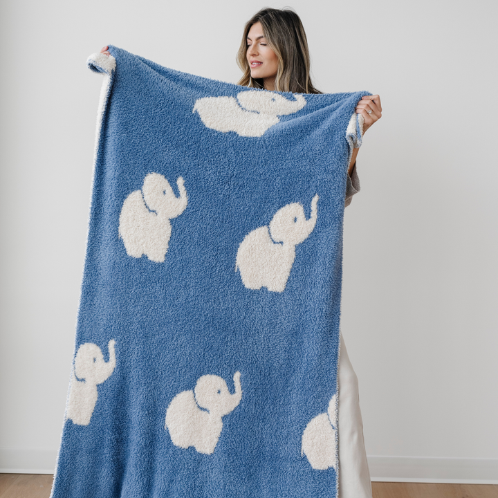 The Saranoni Double-Layer BAMBONI¨ Toddler Blankets in Elephant with animal print style feels comforting like a baby knit blanket.