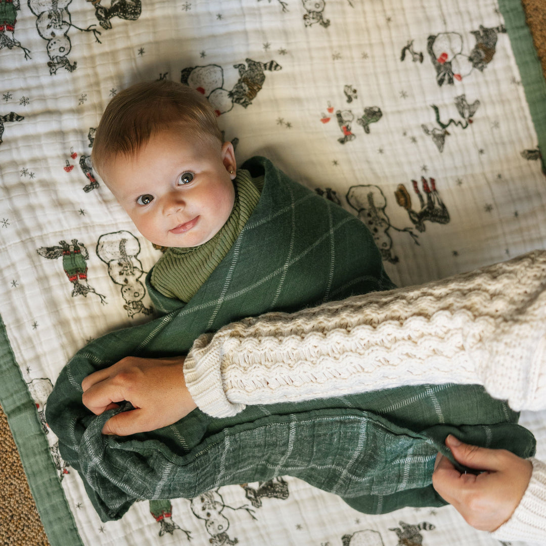 Evergreen Plaid baby blanket from Little Unicorn, quilted comfort as muslin blankets baby.