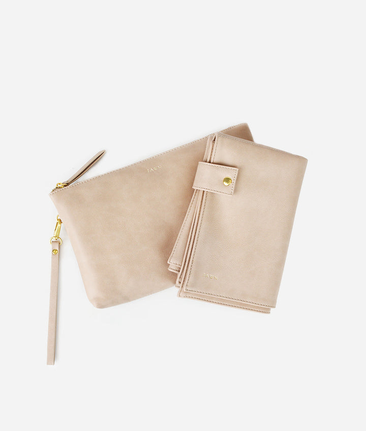 Fawn Design Changing Clutch Bag in Beige with matching faux leather changing mat