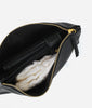 Inside of the Fawn Design Changing Clutch Bag in Matte Black Faux leather diaper changing bag