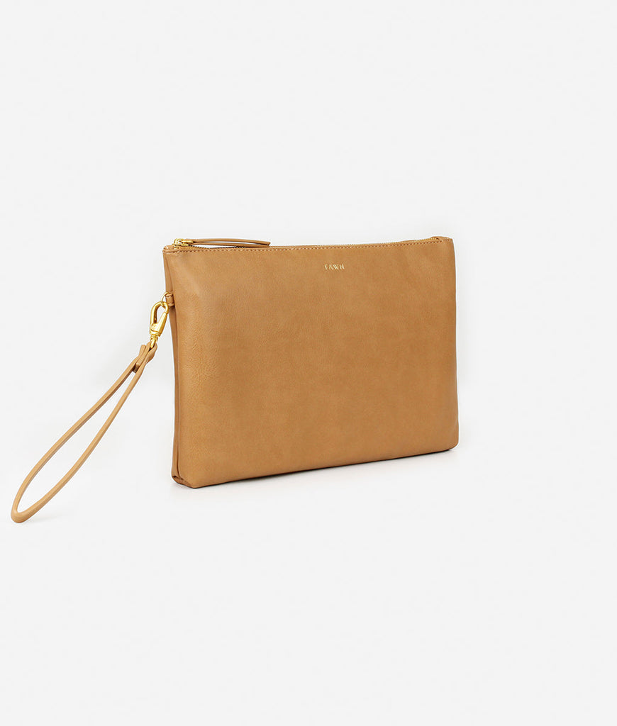 Fawn Design Changing Clutch Bag in tan faux leather with wrist strap