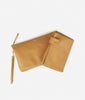 Fawn Design Changing Clutch Bag in Tan Faux Leather with matching faux leather diaper changing mat