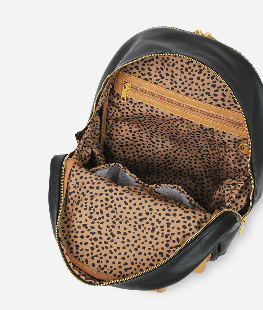 Fawn Design Diaper Pack in Black and Tan  with two Interior bottle pockets and three interior pockets