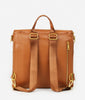 Fawn Design The Original Diaper Bag in Brown, worn as a backpack or messenger style