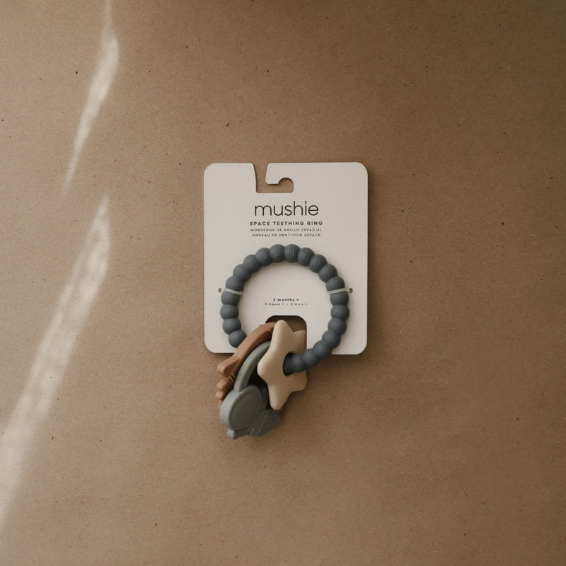 Teething ring in space color packaging by Mushie