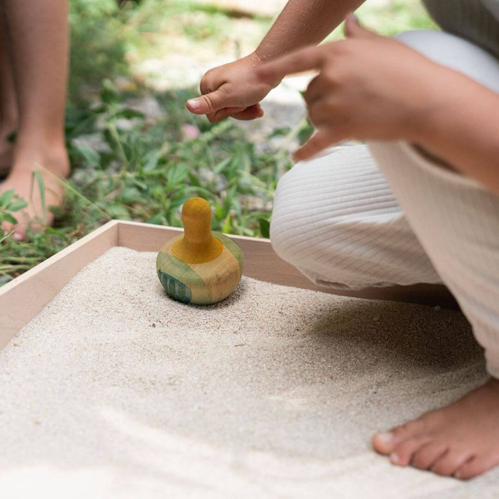 Grapat Flowing Yellow Rocking Bird wooden toy for toddlers.