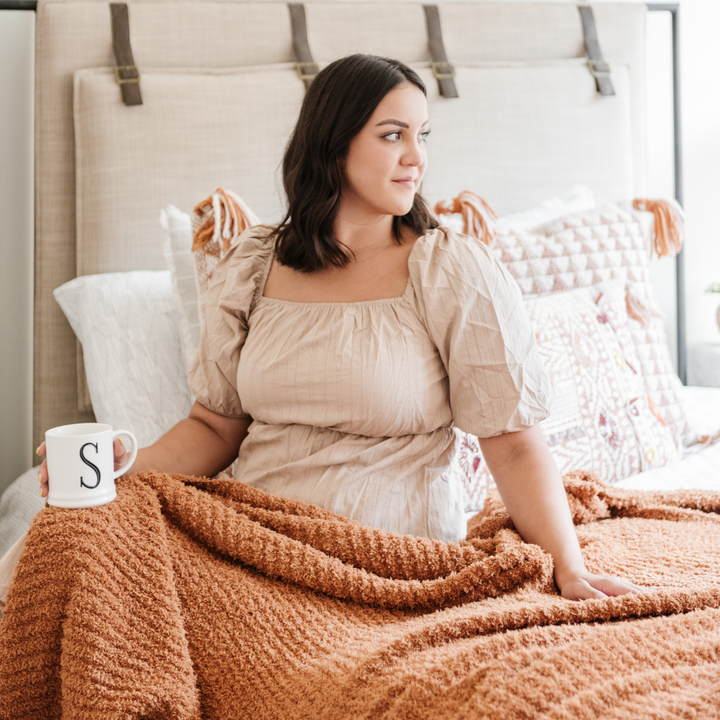 This Ginger color Saranoni Ribbed BAMBONI¨ Throw Blanket is a stylish way to introduce a Baby boy blanket upgrade.