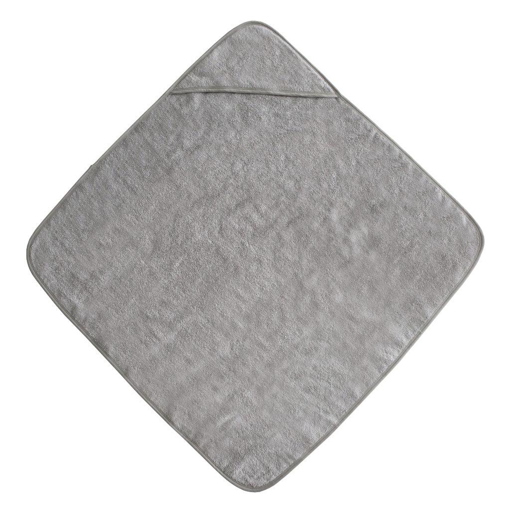 Flat lay of Mushie gray hooded towel