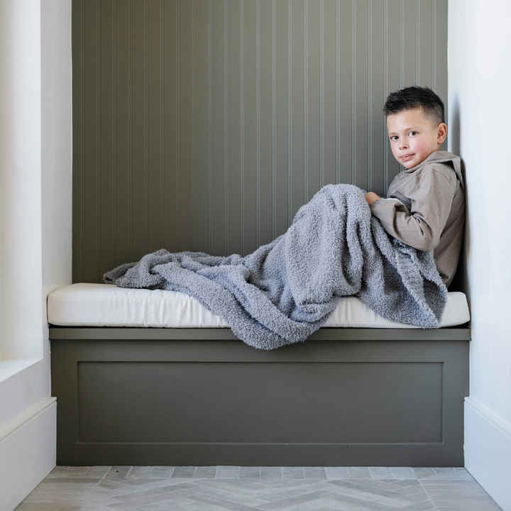 Soft and plush Gray Saranoni BAMBONI¨ Toddler Blanket, perfect as a baby blanket.