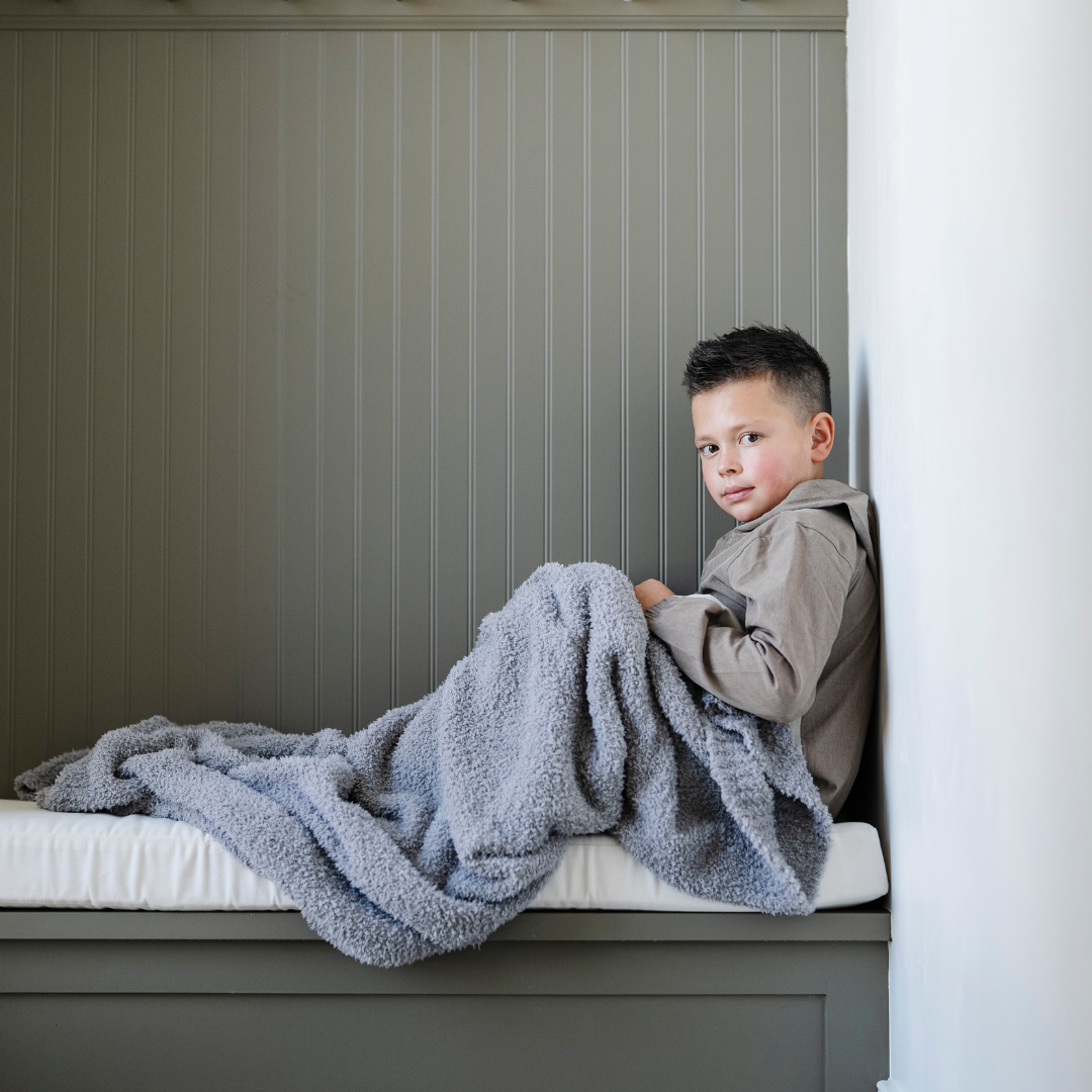The Grey Saranoni BAMBONI¨ Toddler Blanket keeps toddlers warm and happy as a baby boy blankets option.