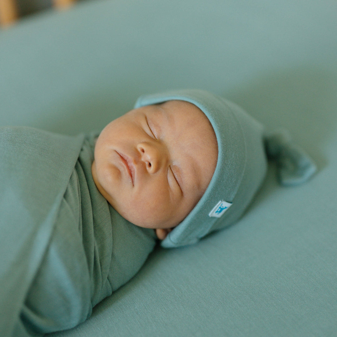 Little Unicorn’s Stretch Knit Crib Sheet - Harbor adds a touch of charm, pairing beautifully with coordinating baby crib sheets.