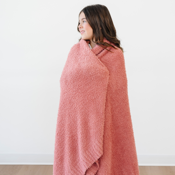 Ultra-soft Hibiscus BAMBONI¨ Toddler Blanket by Saranoni makes cuddles easy as toddler blankets.