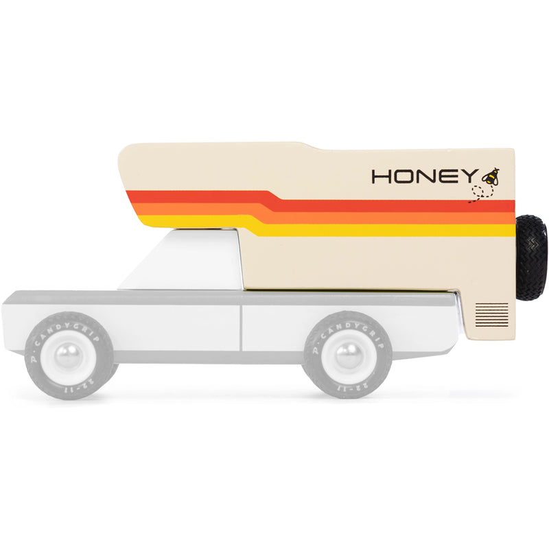 Candylab Honeybee camper, a charming wooden toy vehicle accessory.