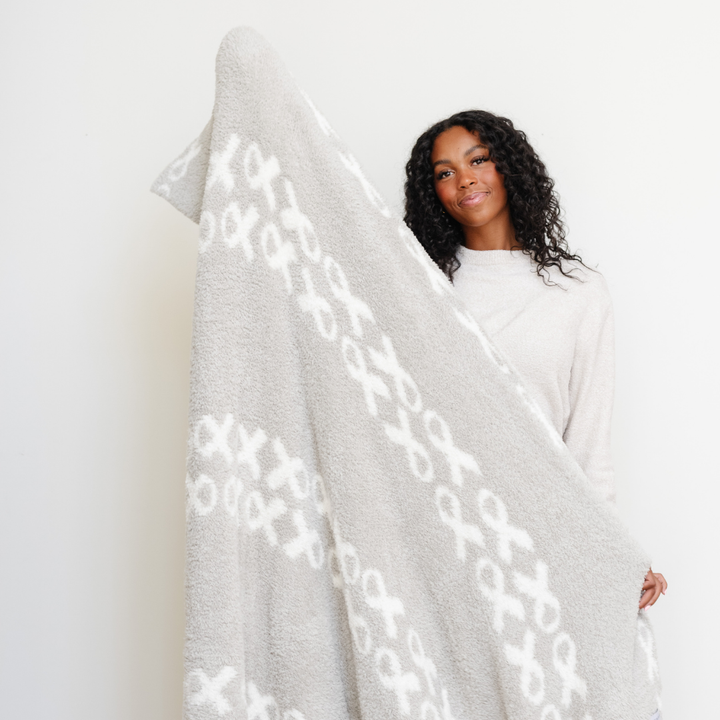 Perfect for cuddles, the Saranoni Double-Layer BAMONI¨ Throw Blanket in Hope delivers plush coziness, ranking high among the best toddler blankets.