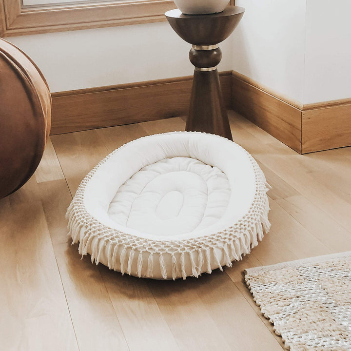 The Finn + Emma Oval Play Mat creates a soft, stylish space for tummy time and playÑan essential baby play mat for modern nurseries.