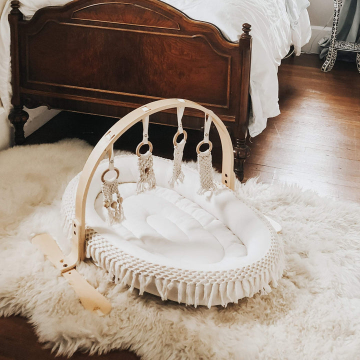 The Finn + Emma Oval Play Mat combines organic materials and modern design, making it one of the best play mats for babies to enjoy daily.