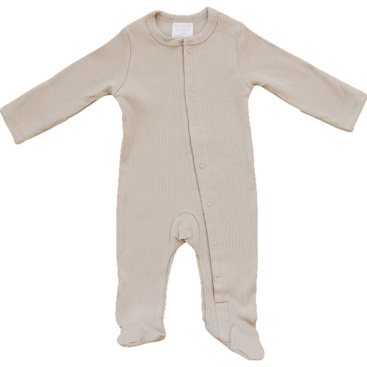 Oatmeal Organic Cotton Ribbed Snap by Mebie Baby, worn by a baby on a play mat.