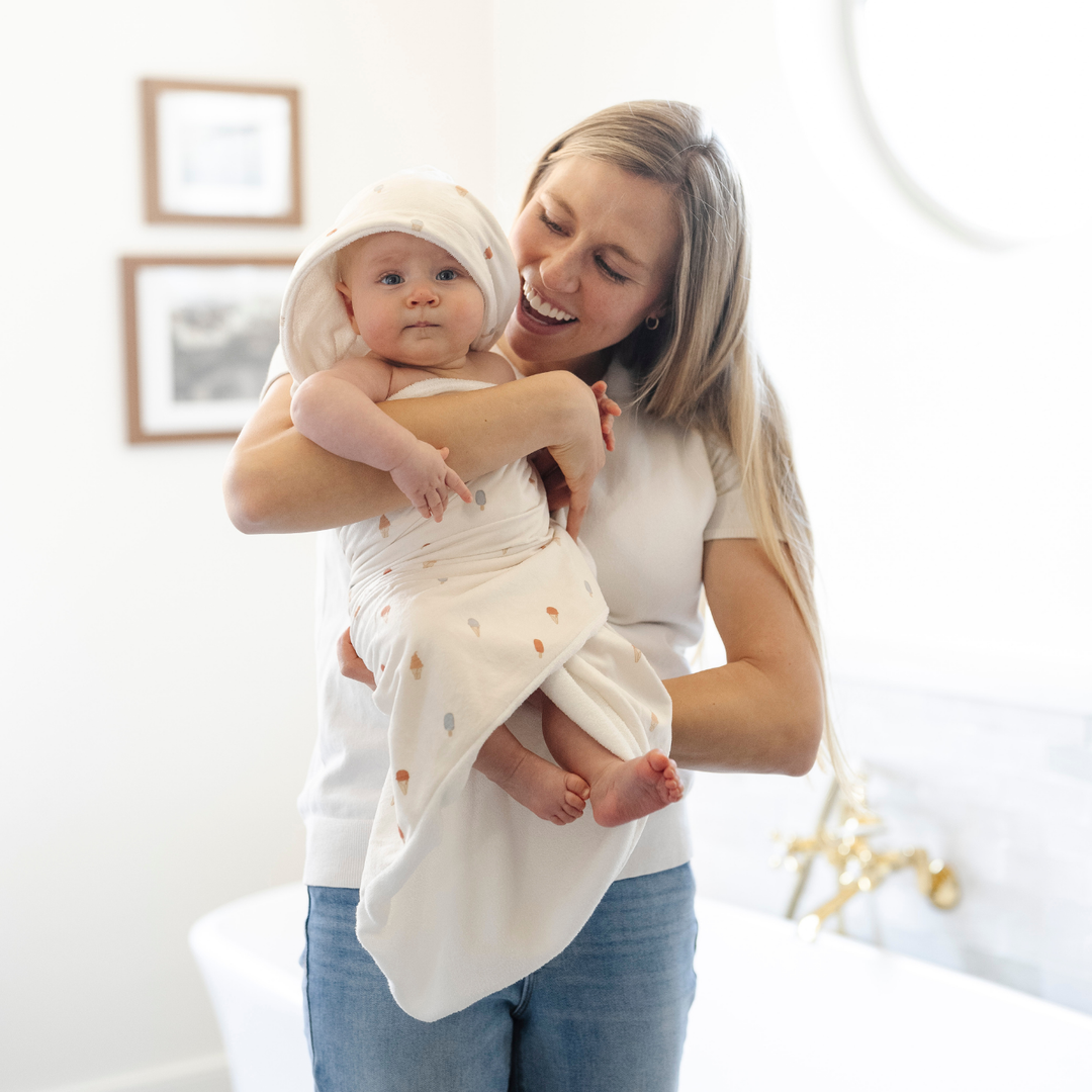 Bath or poolside, Saranoni Hooded Towels in Ice Cream keep infants cozy, a soft baby bath towel.