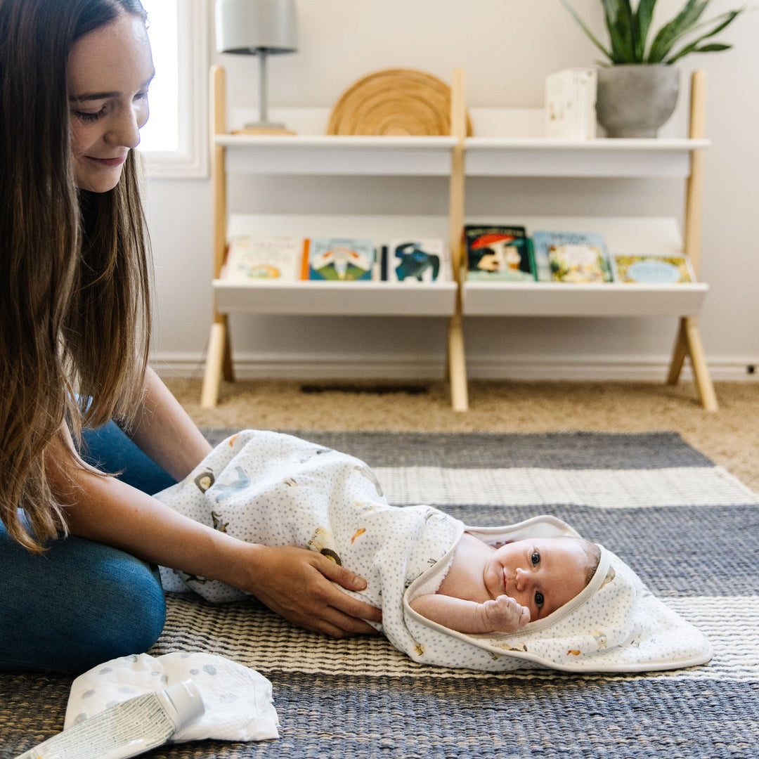 Little Unicorn Infant Hooded Towel - Party Animals featuring fun party animal print, hooded baby towel for newborn comfort