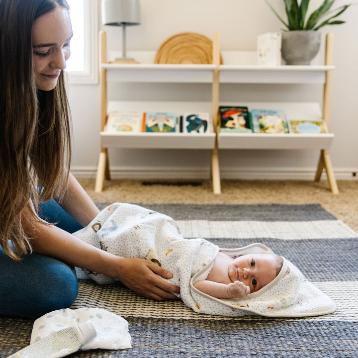 Little Unicorn Infant Hooded Towel - Party Animals featuring fun party animal print, hooded baby towel for newborn comfort
