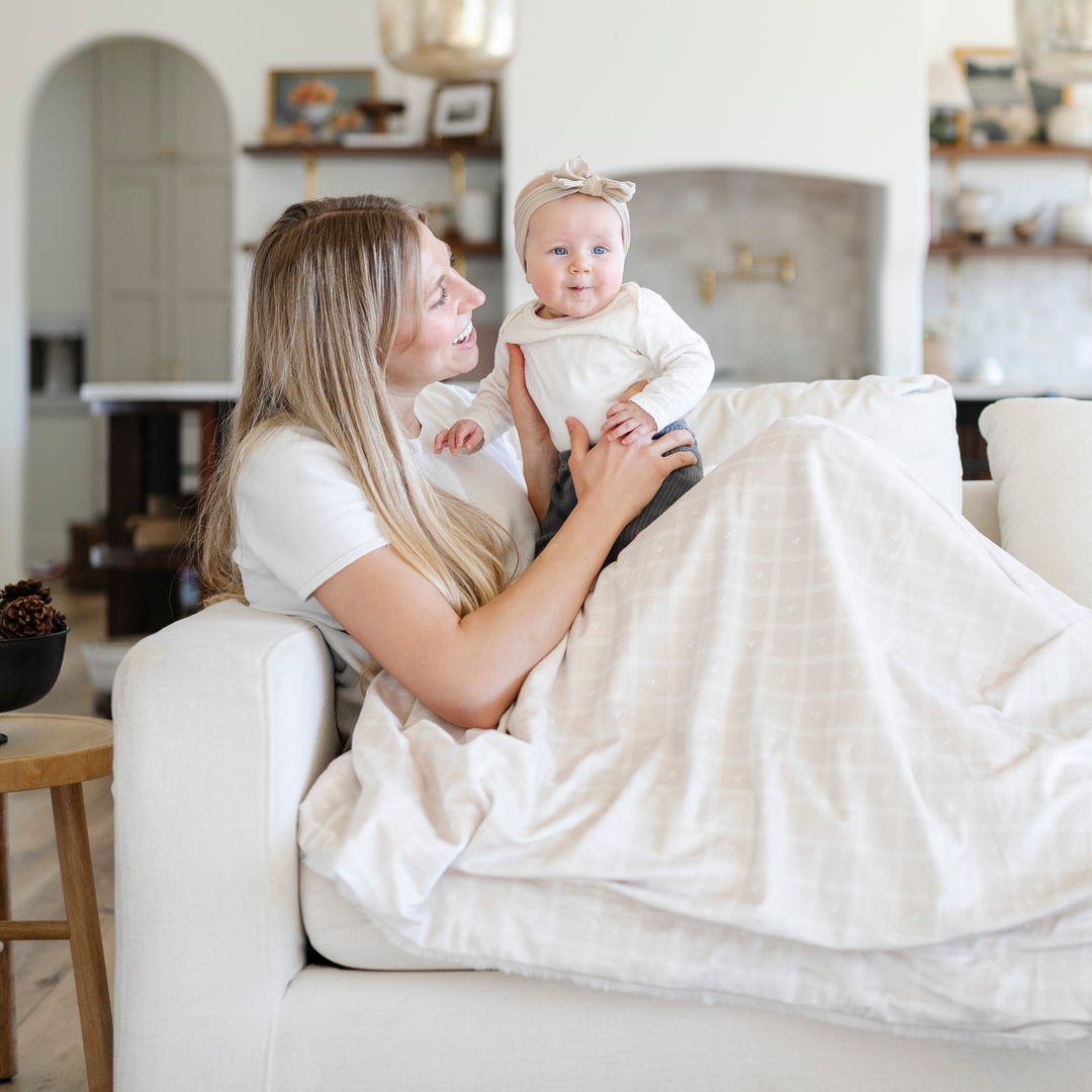 Wrap your little one in the Ivy Minky/Lush XL Blanket, a soft baby boy blanket from Saranoni.