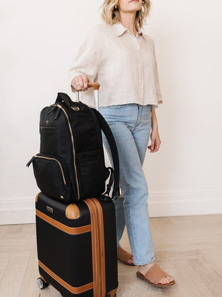 JuJuBe Classic Diaper Backpack in Black with a trolley sleeve