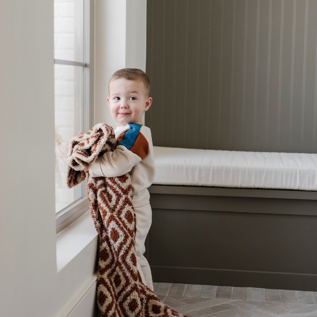 Saranoni BAMBONI¨ Receiving Blanket in Khmer Taupe brings luxurious softness and warmth, ideal for a newborn receiving blanket.