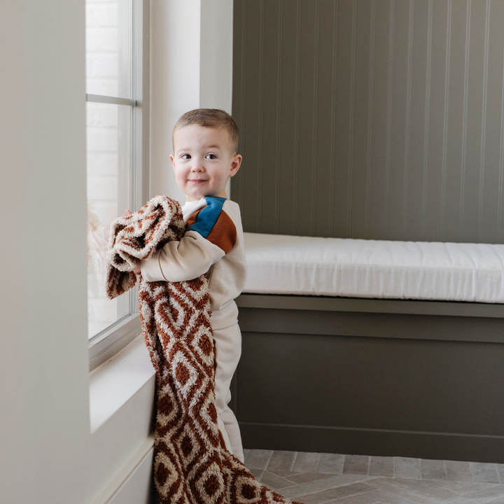 Saranoni BAMBONI¨ Receiving Blanket in Khmer Taupe brings luxurious softness and warmth, ideal for a newborn receiving blanket.