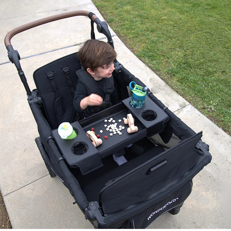 Upgrade your Wonderfold L4 stroller wagon with the Flex Snack Tray, a smart stroller accessory for travel and daily adventures.