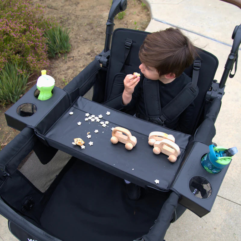 Wonderfold Flex Snack Tray fits the L4 wagon stroller, offering a clean and convenient space for snacks during family outings.