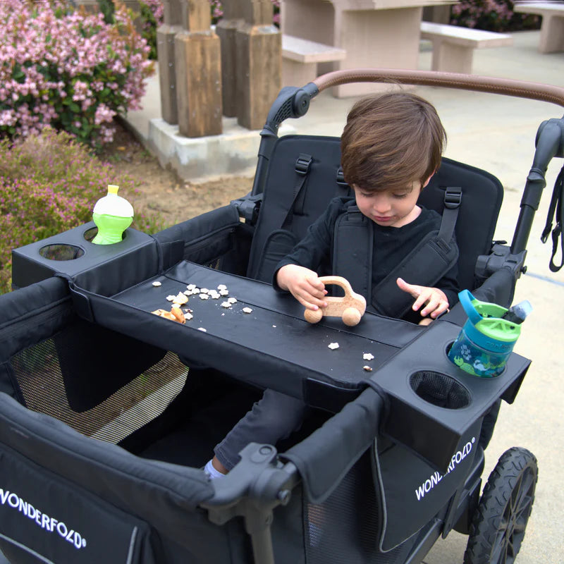 Designed for the L4 stroller wagon, the Wonderfold Flex Snack Tray keeps snacks within reach and kids content on the go.